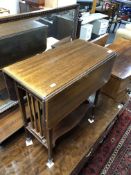 A 19th century inlaid mahogany Sutherland table.