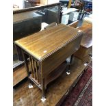 A 19th century inlaid mahogany Sutherland table.