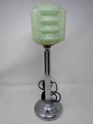 A chrome Art Deco table lamp with green glass shade (height 43cm).