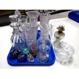 A tray containing 20th century glassware including paperweight, decanters with stoppers,