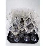 A tray containing assorted wine glasses and champagne flutes.