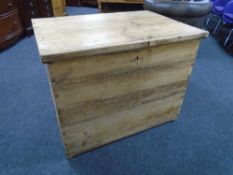 An antique pine hay box.