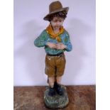 A vintage chalk figure of a boy scout (height 67cm).