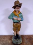 A vintage chalk figure of a boy scout (height 67cm).