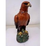 A Beswick Beneagles scotch whisky Golden Eagle decanter, sealed with contents.
