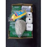 A box containing Numatic hoover bags, hand sanitizer machines,