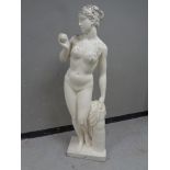 A painted concrete garden figure of Eve (height 145cm).