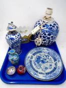 A tray containing oriental wares including blue and white plate,