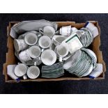 A box containing a large quantity of Johnson brothers dinnerware.