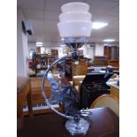A chrome Art Deco table lamp with pink glass shade (height 57.