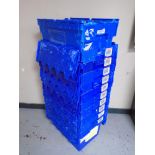 A collection of 12 plastic storage crates with lids.