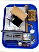 A tray containing Blues Harp harmonica, coinage, pocket watch, Burma Star medal, trinket boxes,