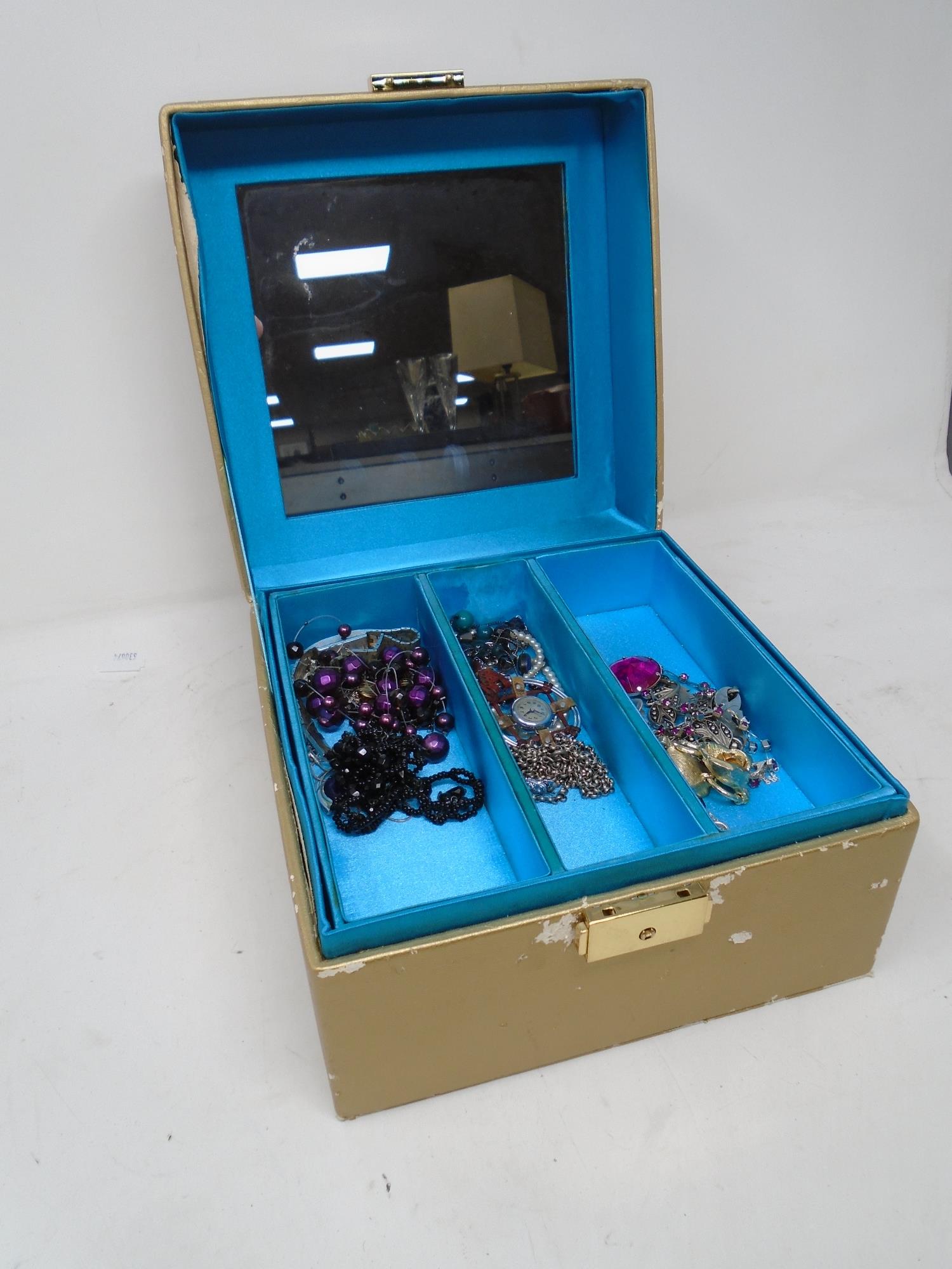 A jewellery box with key containing a small quantity of costume jewellery including beaded - Image 2 of 2