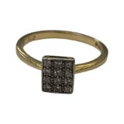 An 18 carat gold 12 stone square set diamond ring (3.