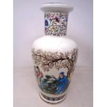 An oriental style baluster vase together with a Spanish porcelain vase.