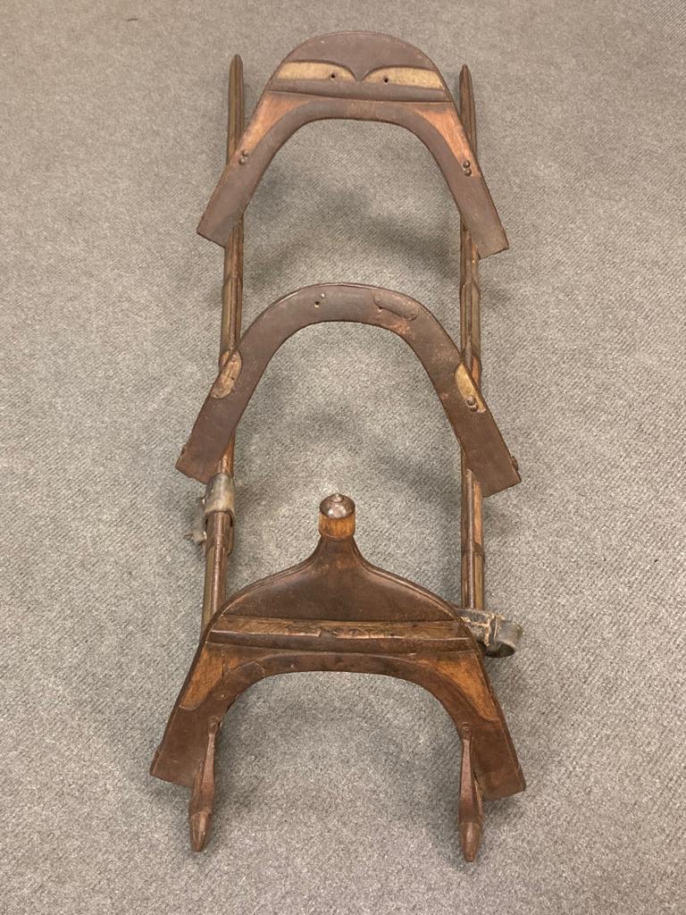 An antique Mahawi (camel saddle), iron enforced curved wooden rails with leather toggles, - Image 2 of 2