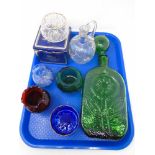 A tray containing large green glass decanter with stopper, other glassware including Caithness vase,