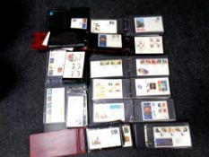 A box of 12 of albums of First Day Covers.