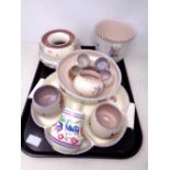 A tray of Poole pottery including vases, pots, serving platter etc.