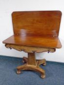 A Victorian mahogany turnover top pedestal tea table.