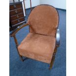 A 20th century beech framed armchair.