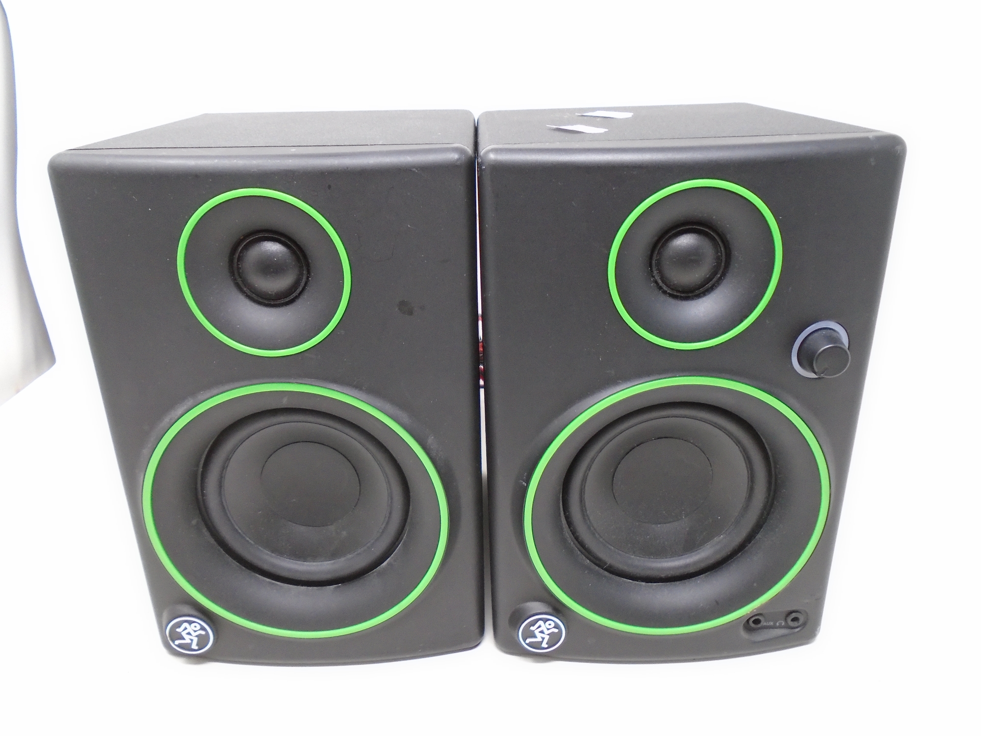 A Creative Reference multimedia speaker together with a passive speaker.