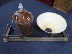 A 19th century brass fire fender (AF) together with a vintage stoneware flagon in wicker basket