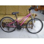 A girl's Apollo Vivid front suspension mountain bike.