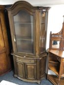 An Italian style glaze door display cabinet with cupboard fitted beneath,