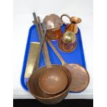 A tray of antique copper and brassware including ladles, jug, roasting pan etc.