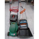 A Qualcast Easi-Trak 320 electric lawn mower with grass box together with a Black & Decker LR101