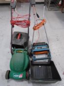 A Qualcast Easi-Trak 320 electric lawn mower with grass box together with a Black & Decker LR101