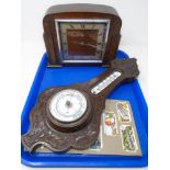 A tray containing aneroid barometer,