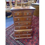 A Chapman's Siesta mahogany miniature chest on chest.