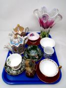 A tray containing two Saddler commemorative teapots, coloured glass flower vase,