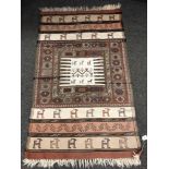 A Caucasian rug of zoomorphic design,