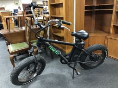 A Nakto fat tyre electric bike with key.