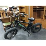 A Nakto fat tyre electric bike with key.