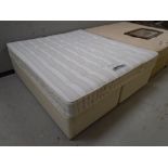 A 6' storage divan base with Sleepeezee concept 1000 mattress.