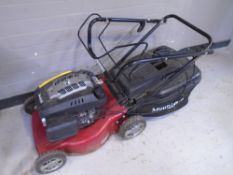 A Mountfield 140cc self drive petrol lawn mower with grass box.