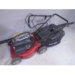 A Mountfield 140cc self drive petrol lawn mower with grass box.