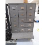A 20th century fifteen drawer metal industrial style filing chest on castors.