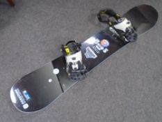 A snow board with bindings.