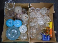 Two boxes containing 20th century clear and coloured glassware, petrol glass bowls, flower vase,