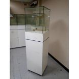 A jeweller's glass display cabinet on stand with keys.