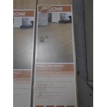 Five packs of Leone warm oak effect laminate flooring.