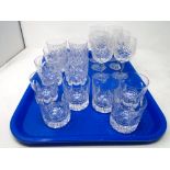 A tray containing assorted glassware including lead crystal, whisky decanters, wine glasses.