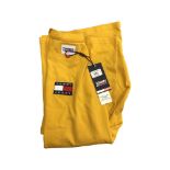 A Tommy Jeans gent's yellow cotton t-shirt, size medium, brand new with tags.