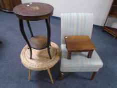 A 20th century bedroom chair upholstered in a striped fabric together with a footstool and two