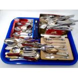 A tray containing miscellaneous cutlery, Viners teaspoons, set of cased cake forks.